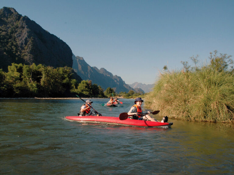 Kayaking the Mekong River to Kao Niaw Farm Stay